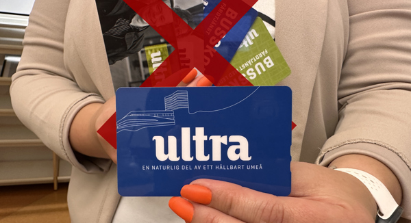 Woman showing new bus card, old cards crossed out