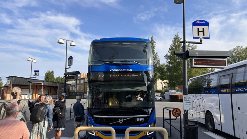 Travellers boarding a bus at Skellefteå bus station
