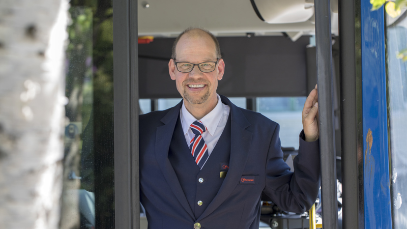 A happy bus driver